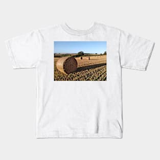 Round bales in evening light Kids T-Shirt